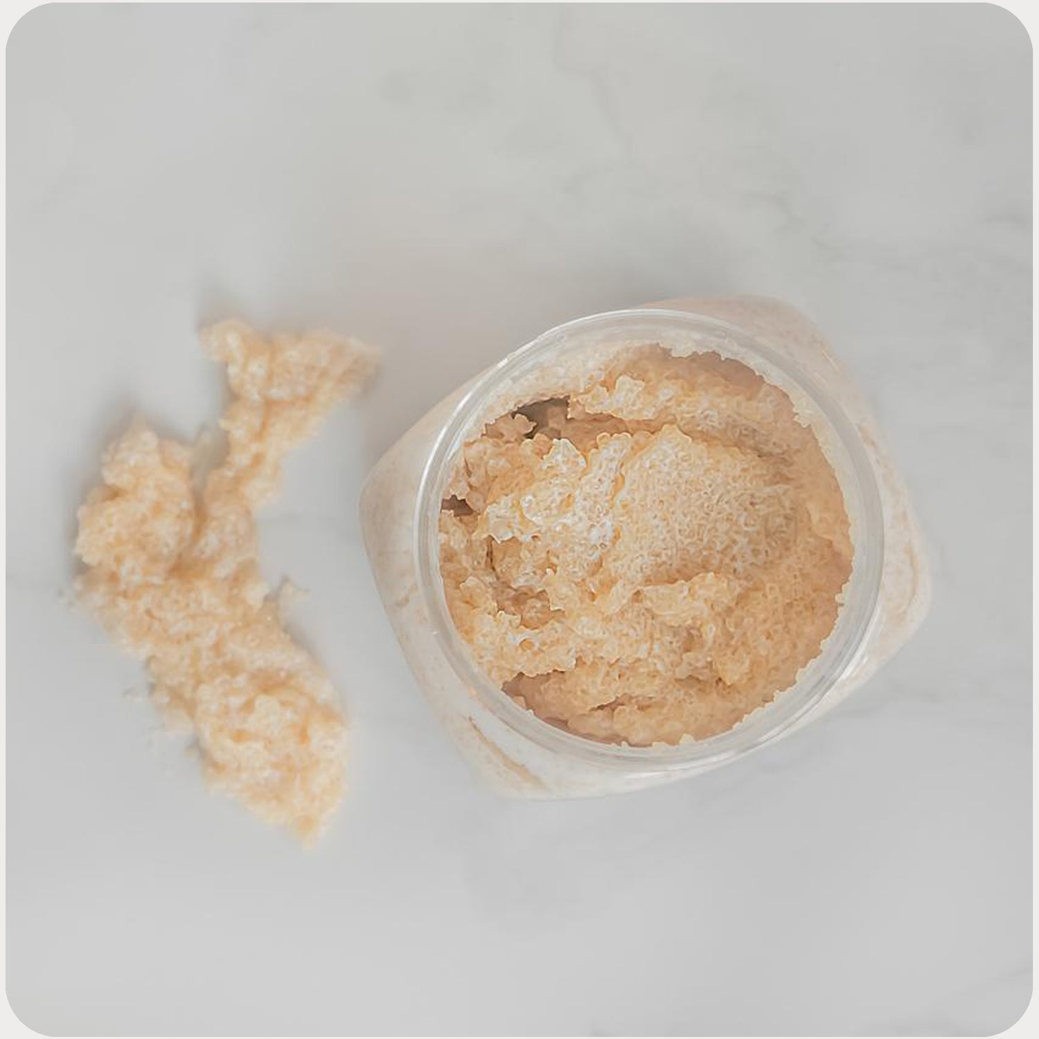 Opened jar of Babe and Body's Peachy Keen Stretch Mark Scrub